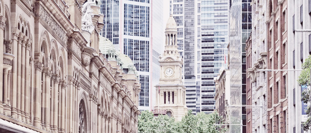 Mix of old and new buildings overlooking a busy Australian city street.